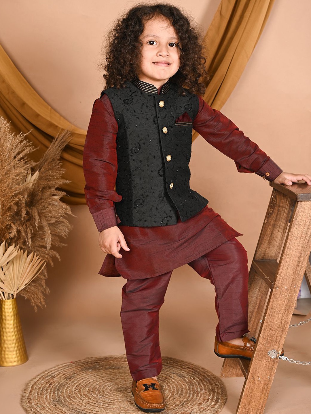 

Pehanaava Boys Mandarin Collar Kurta with Pyjamas & Waistcoat, Burgundy