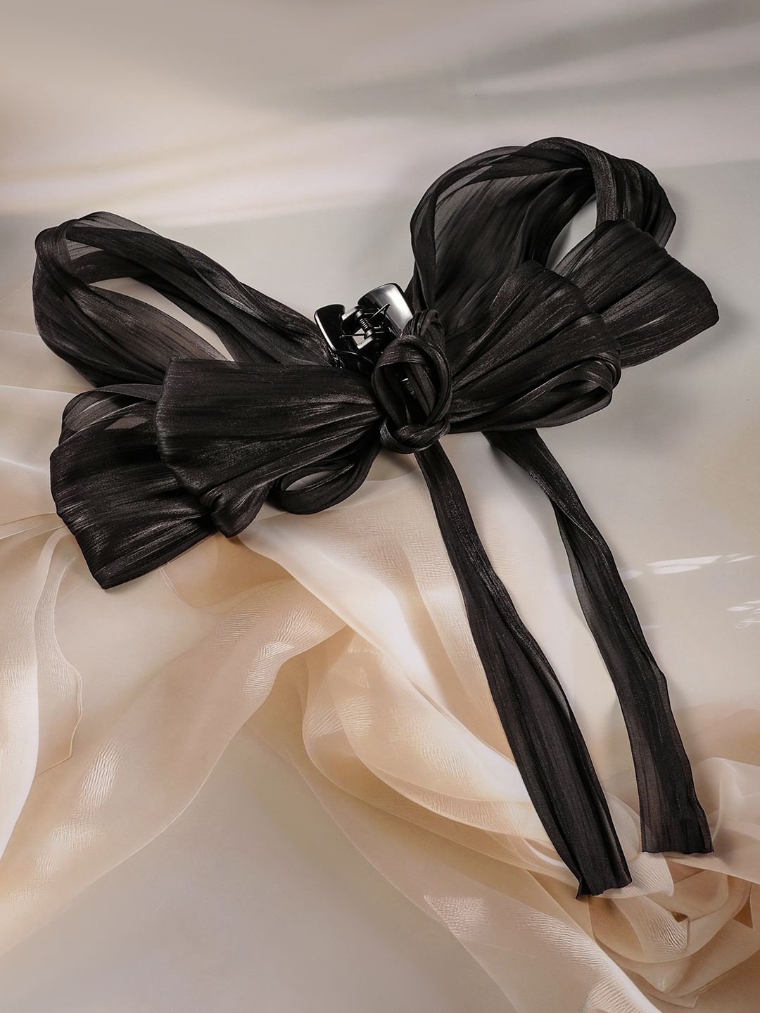

Elegant Black Bow Hair Accessory with Flowing Ribbon Tails