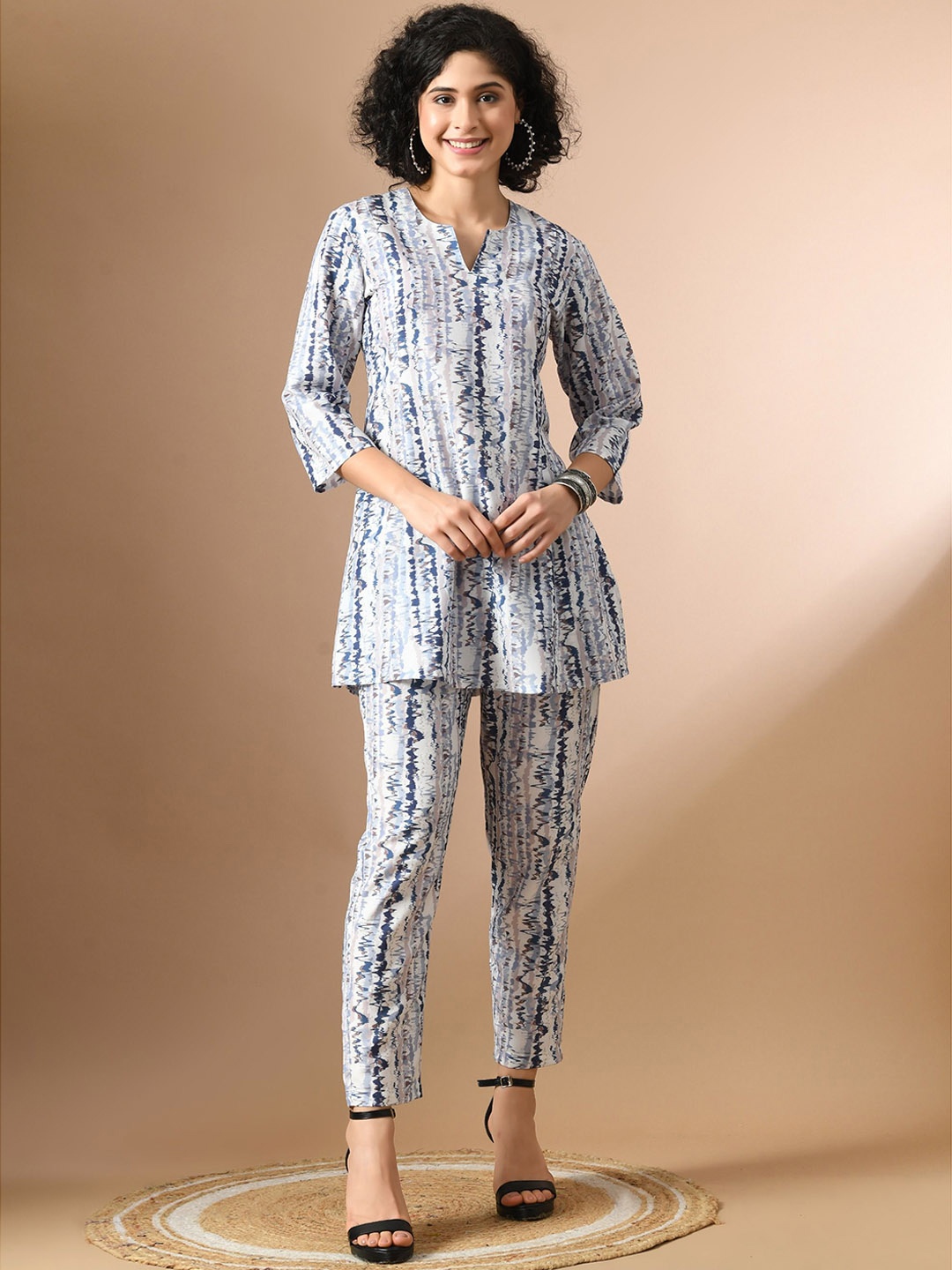 

Sangria White Abstract Printed Tunic & Trousers