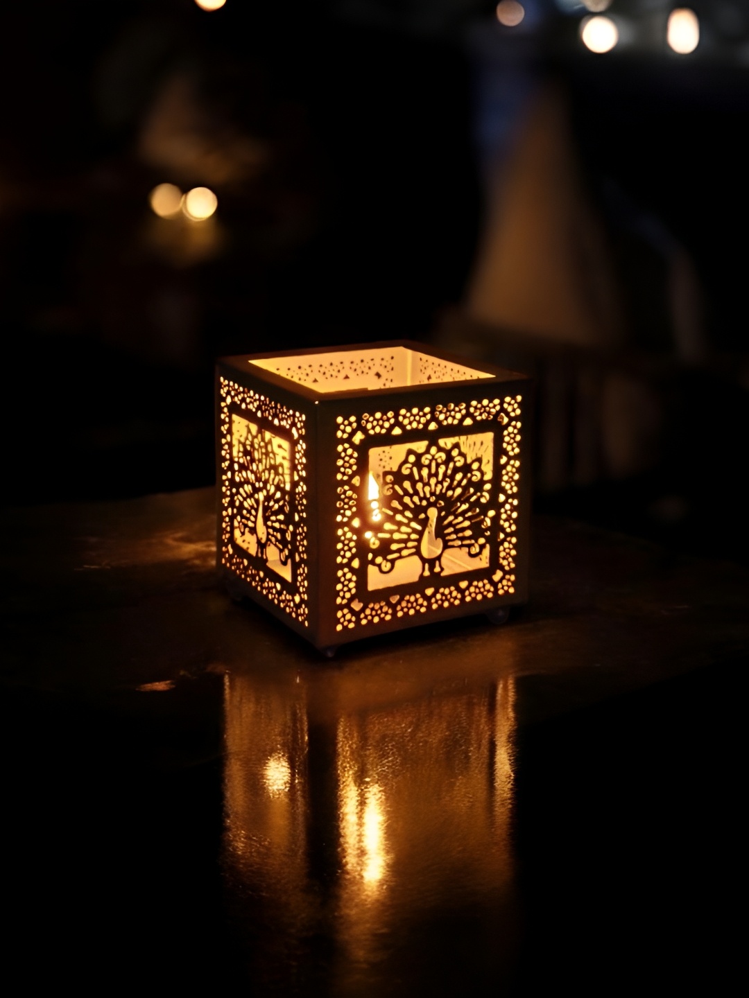 

Extreme Karigari Gold Toned Peacock Textured Candle Holder