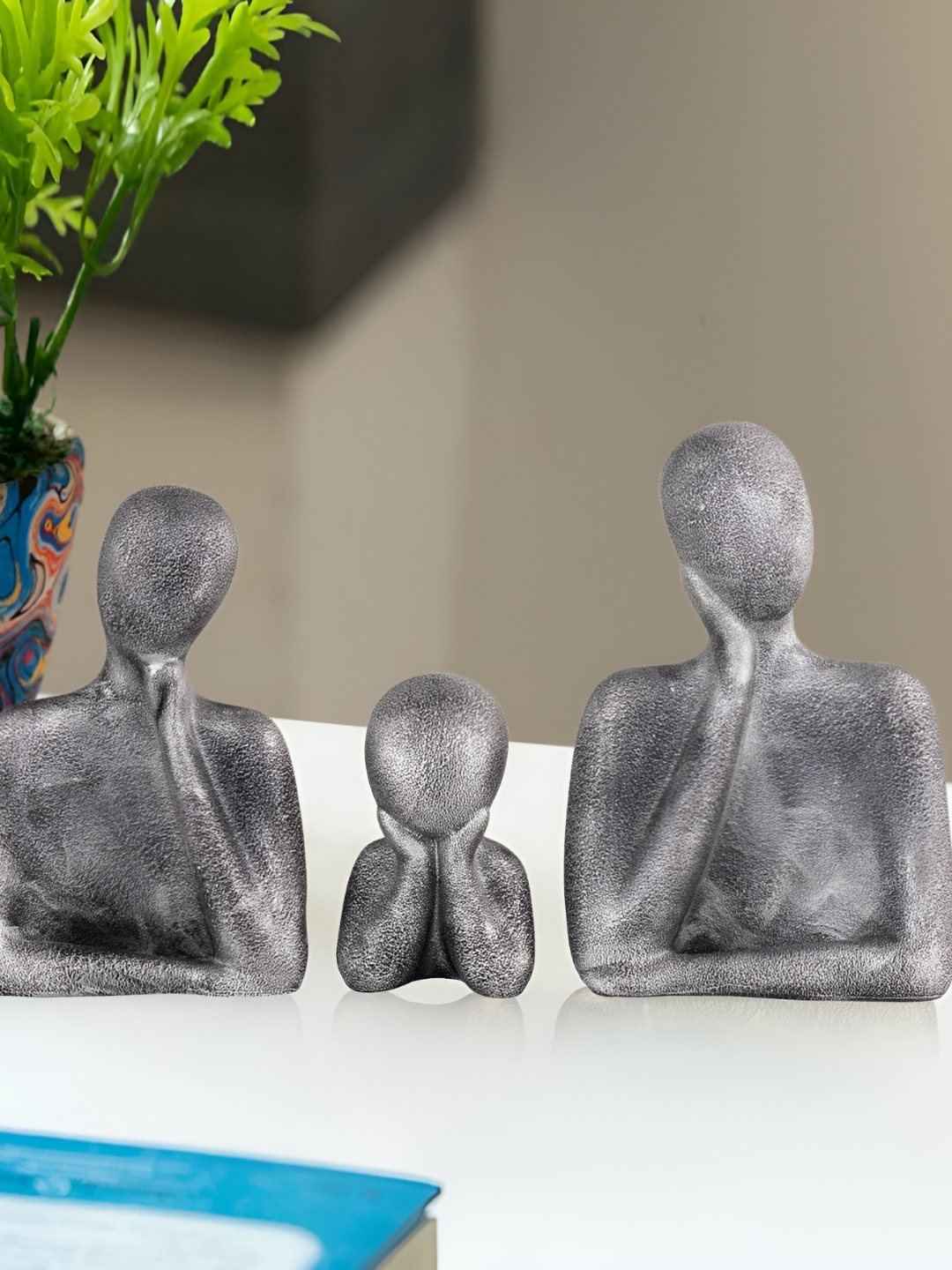 

Zart Silver-Toned Figurine Showpiece