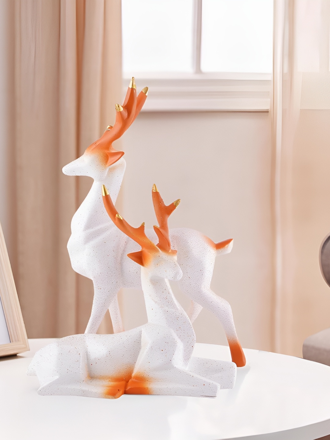 

Zart White & Orange 2 Pieces Figurine Showpiece