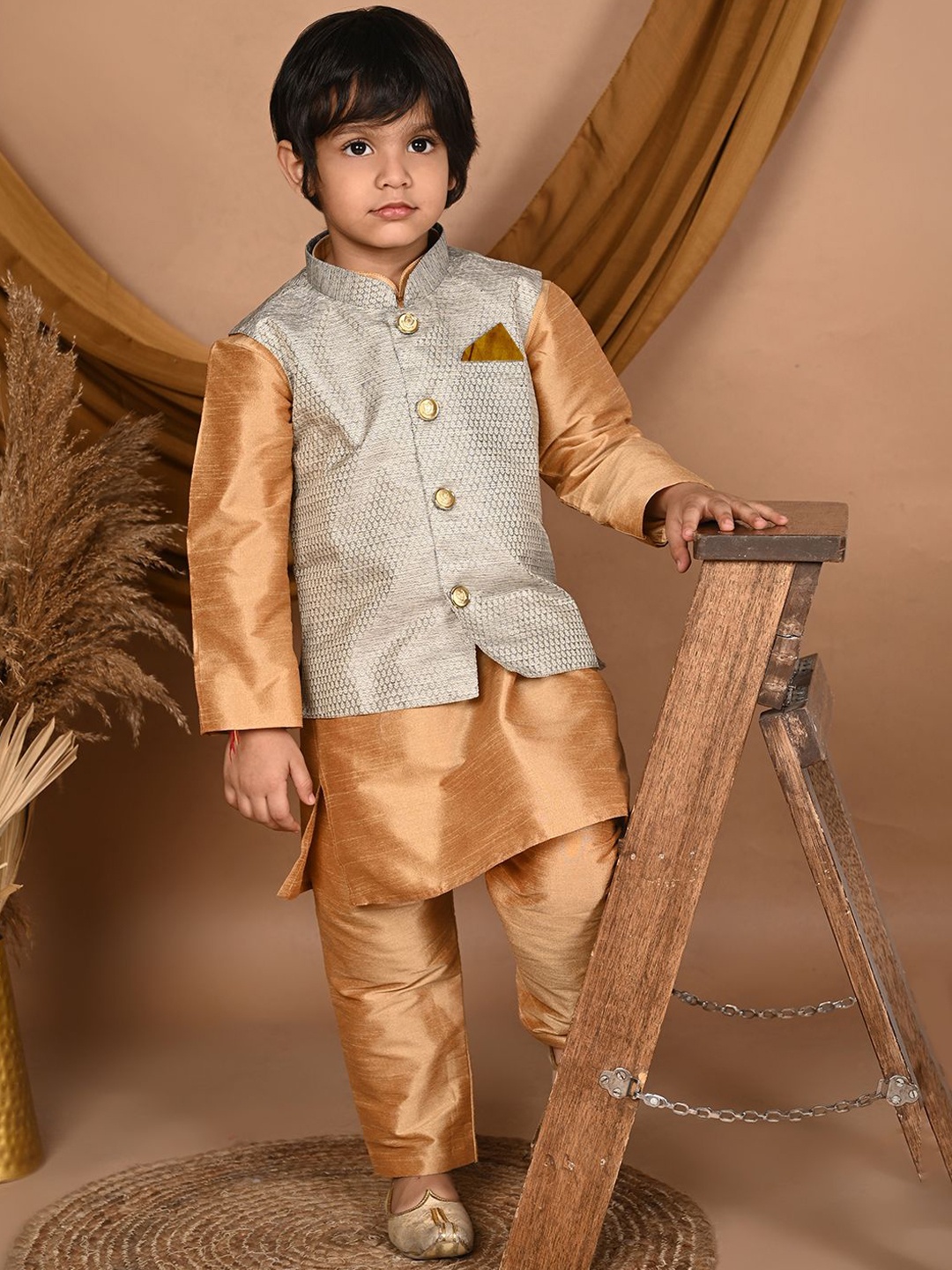 

Pehanaava Boys Mandarin Collar Kurta with Pyjamas & Waistcoat, Gold