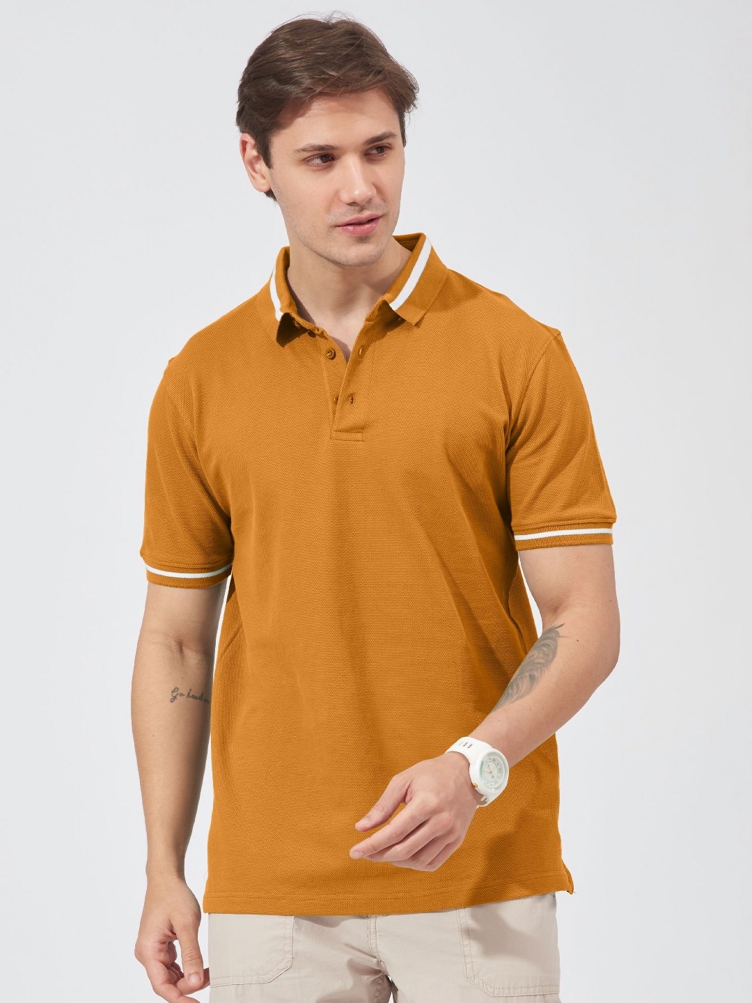 

Maniac Men Solid Polo Collar Cotton Slim Fit T-shirt, Mustard