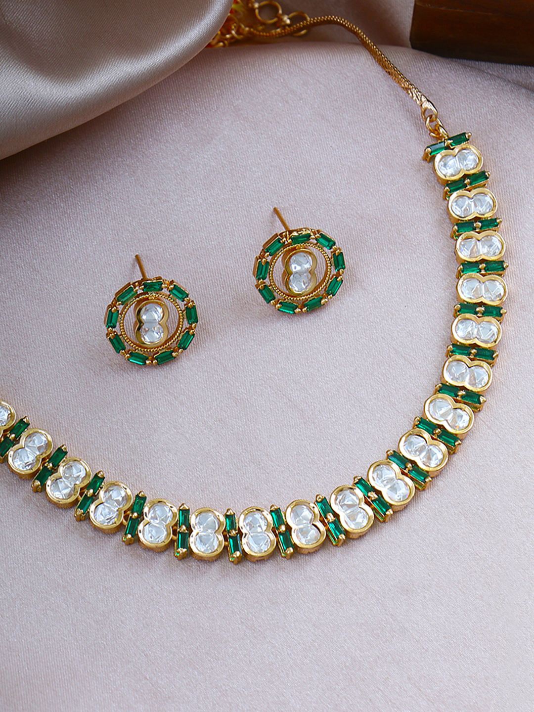 

Adwitiya Collection Gold Plated Polki Kundan Studded Jewellery Set