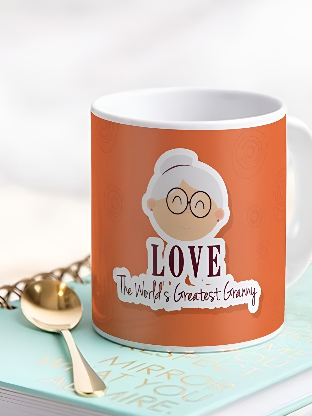 

Indigifts Orange & White Printed Ceramic Matte Mug 330ml