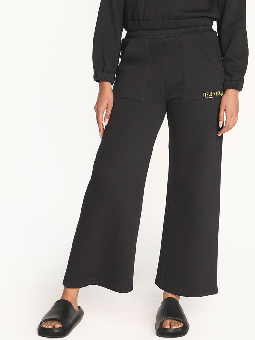 

Hunnit Women Cotton Bell Botton Active Wear Pants with Pockets, Black