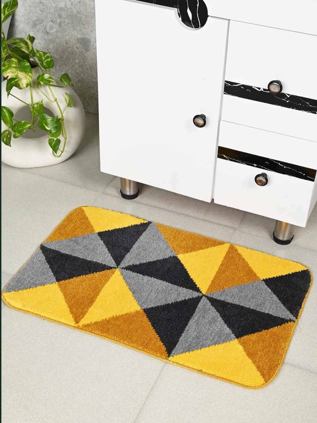 

Saral Home Grey & Yellow Geometric Printed Anti Skid Bath Rug