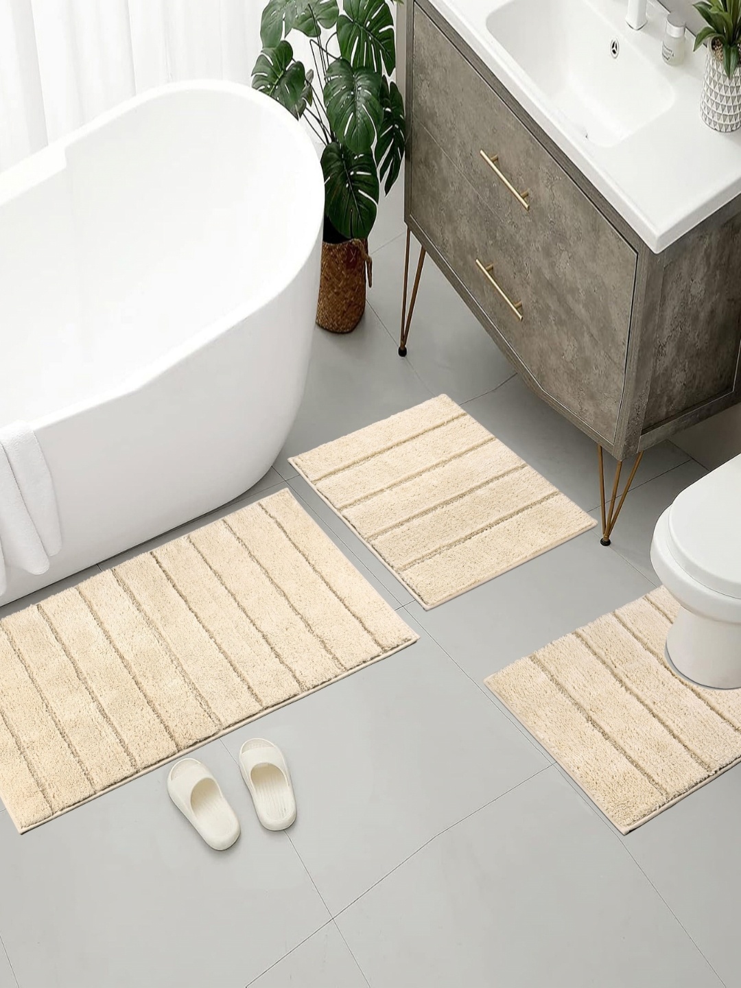 

Saral Home Beige 3 Pieces Striped Pure Cotton Antiskid Bath Rugs