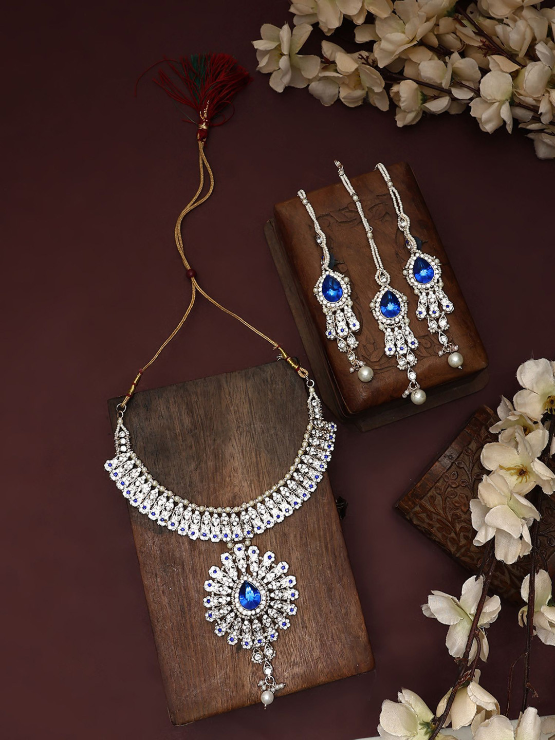 

ANIKAS CREATION Silver-Plated Stones Studded & Beaded Necklace & Earrings With Maang Tika