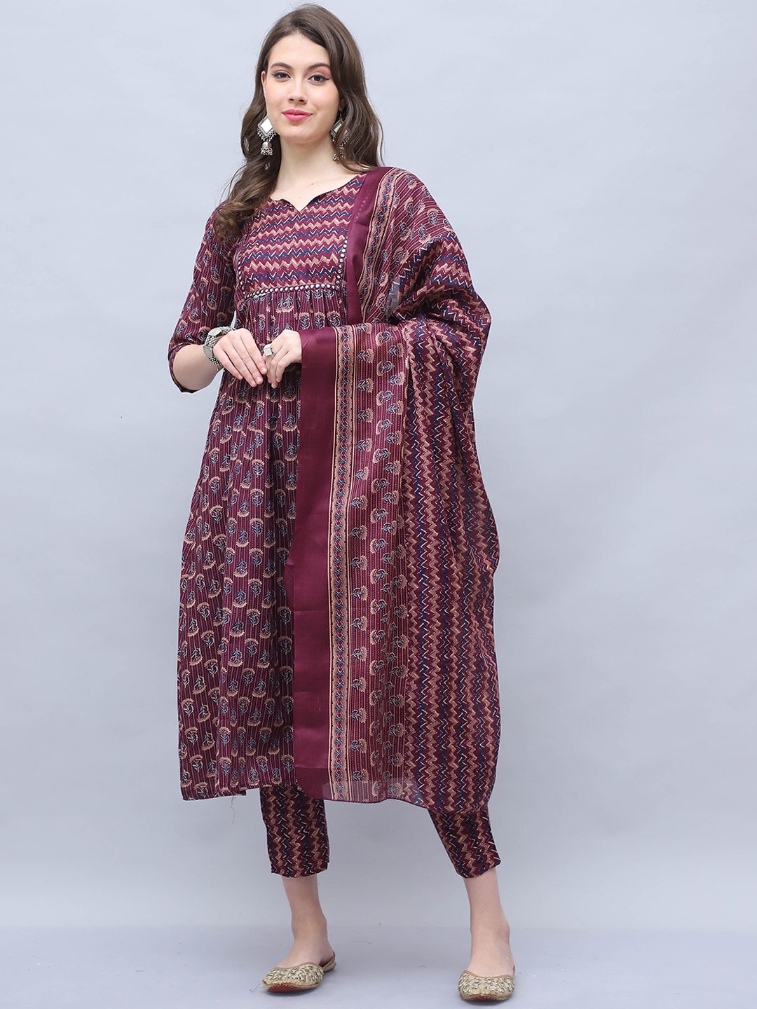 

Roly Poly Ethnic Motifs Printed Mirror Work A-Line Kurta With Trousers & Dupatta, Maroon