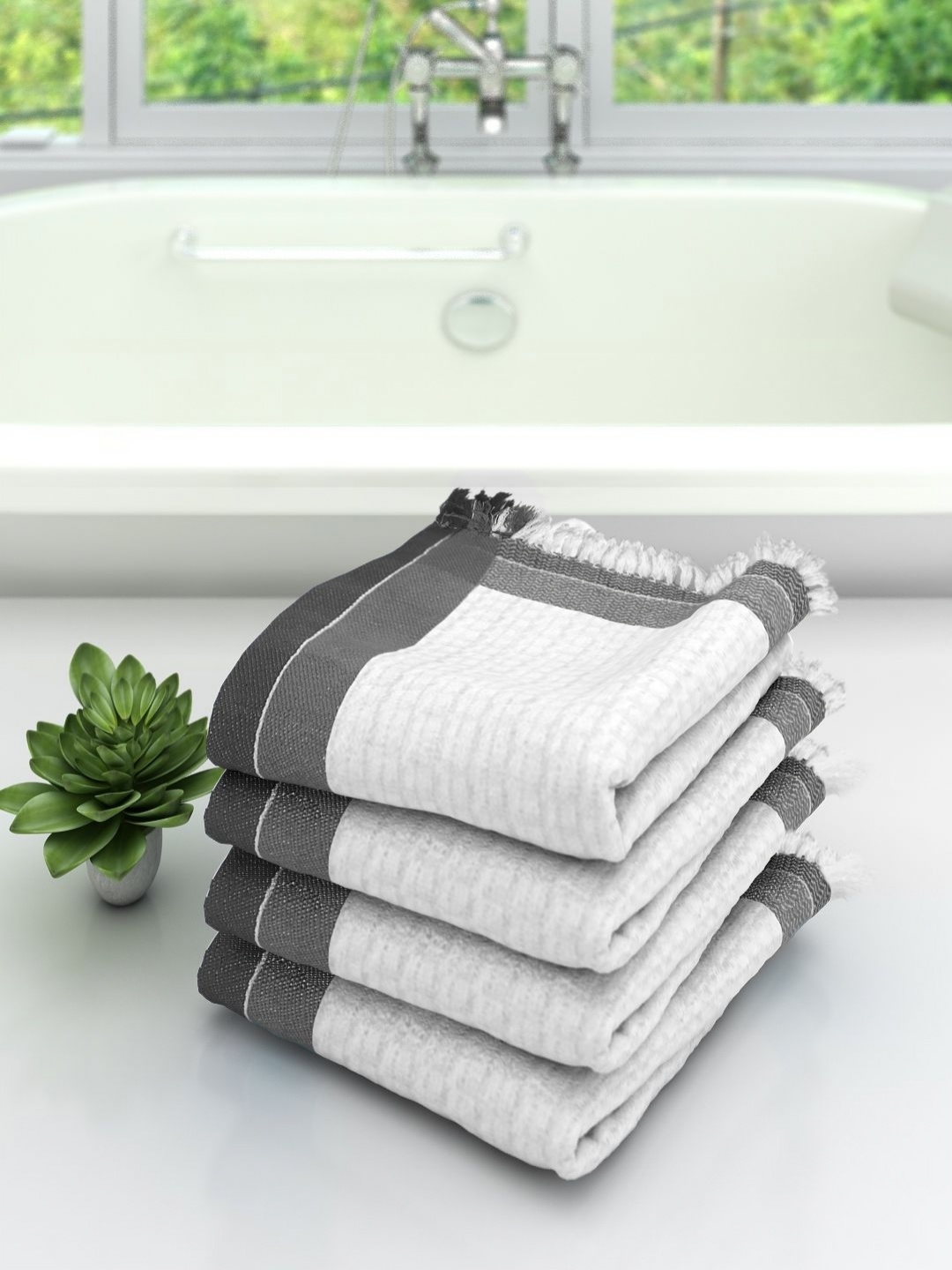 

Aura White & Black 4 Pieces High Absorbent Cotton 210 GSM Bath Towels