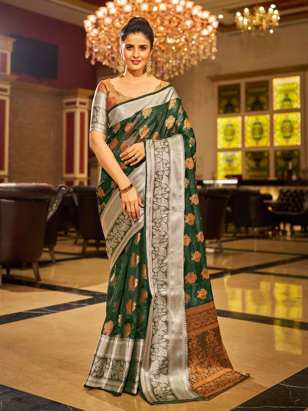 

Krimmple Floral Woven Design Zari Saree, Green