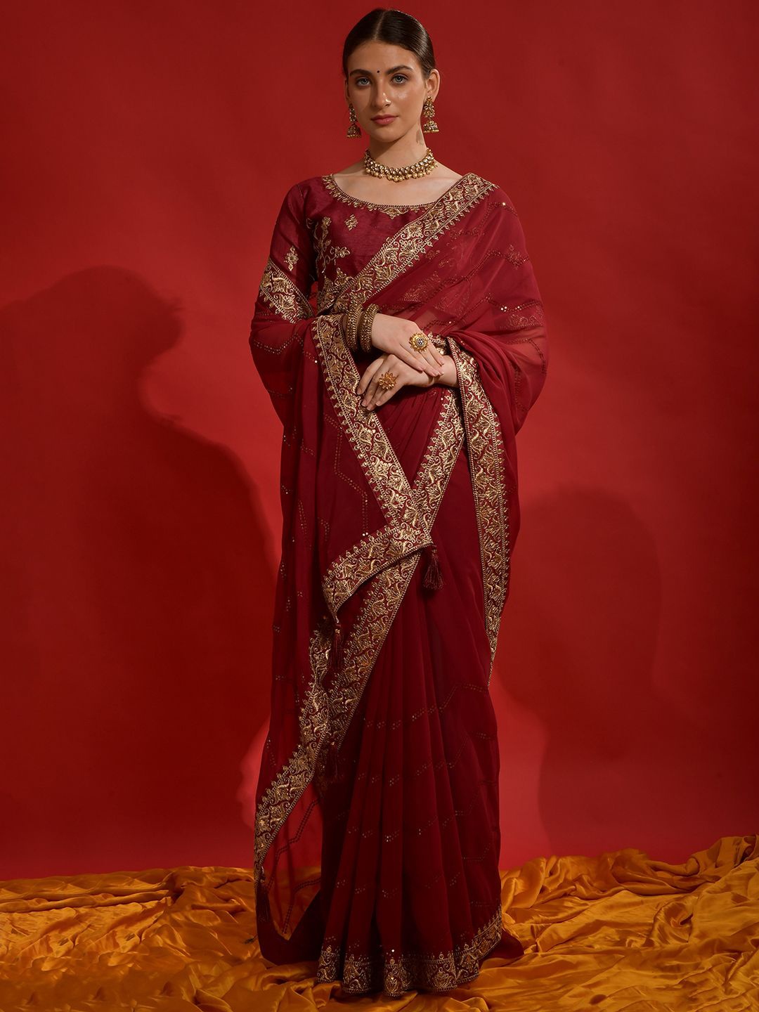 

Sangria Georgette Embroidered Saree With Matching Blouse, Maroon