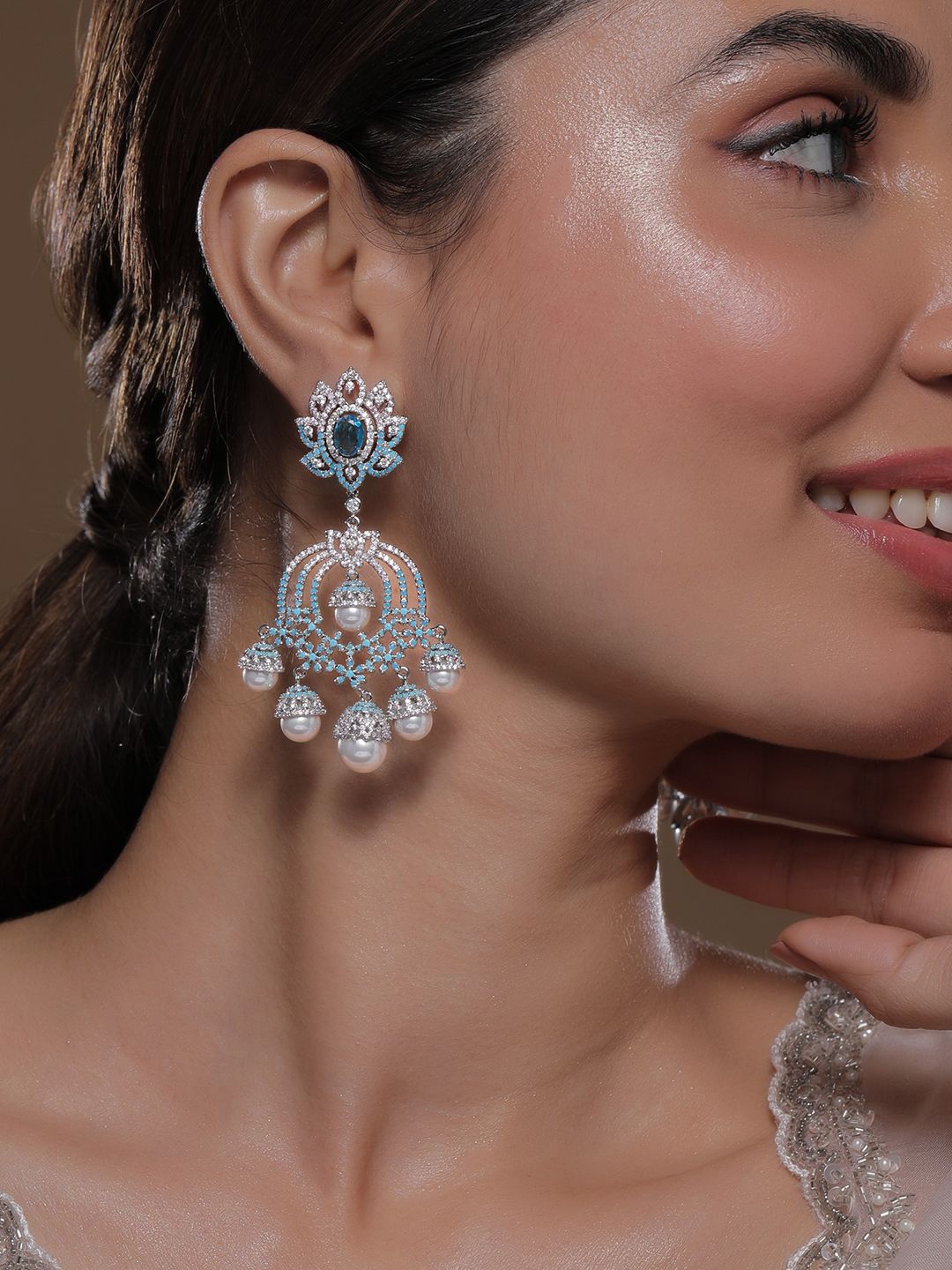 

Rubans Rhodium-Plated TurquoiseBlue &Pink AD & CZ Studded Pearl Drop Big Chandbali Earring, Silver