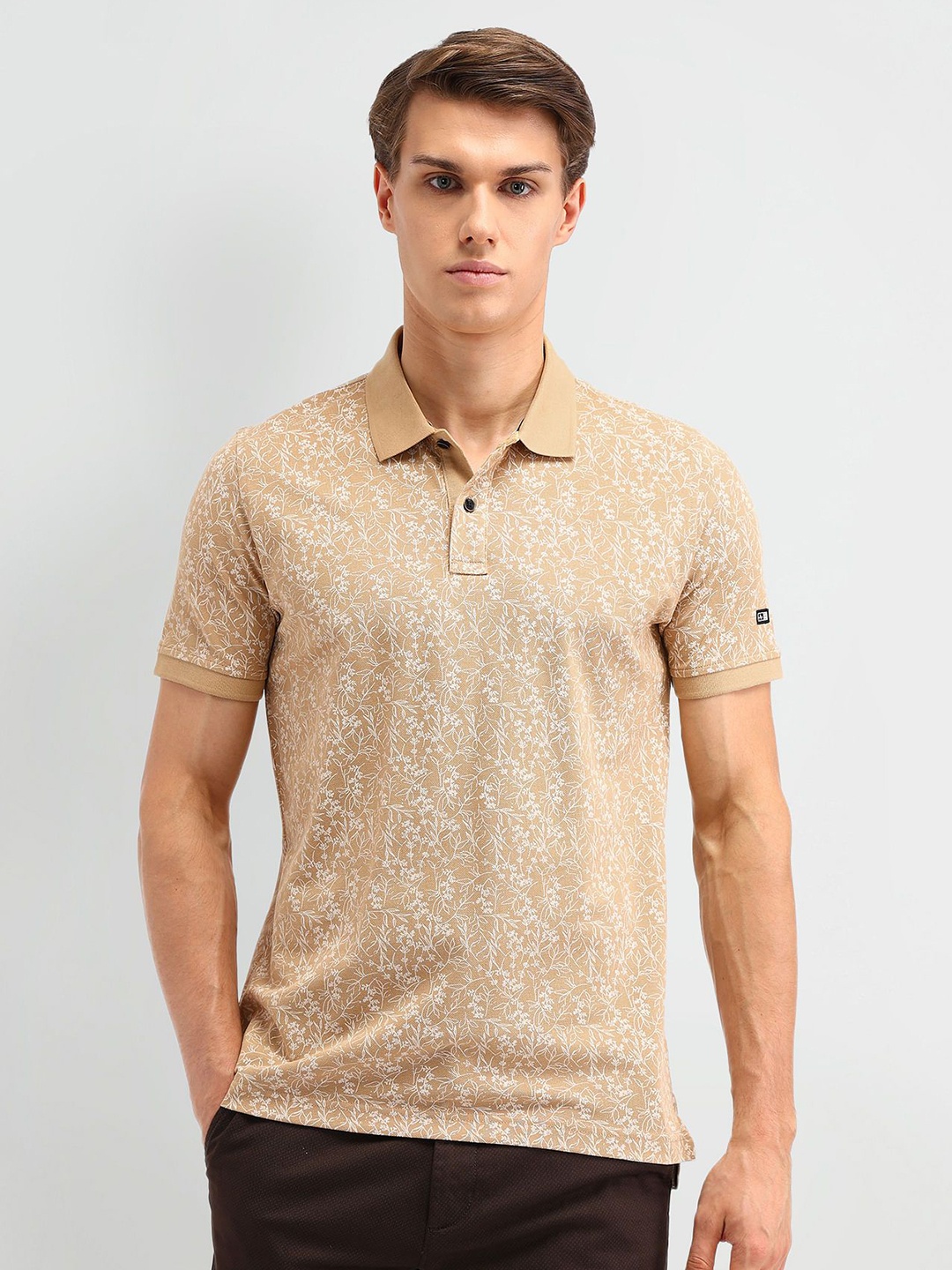 

Arrow Sport Men Floral Printed Polo Collar Cotton T-shirt, Beige