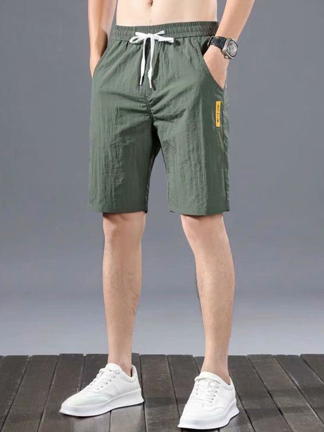 

HERE&NOW Men Solid Mid-Rise Shorts, Olive