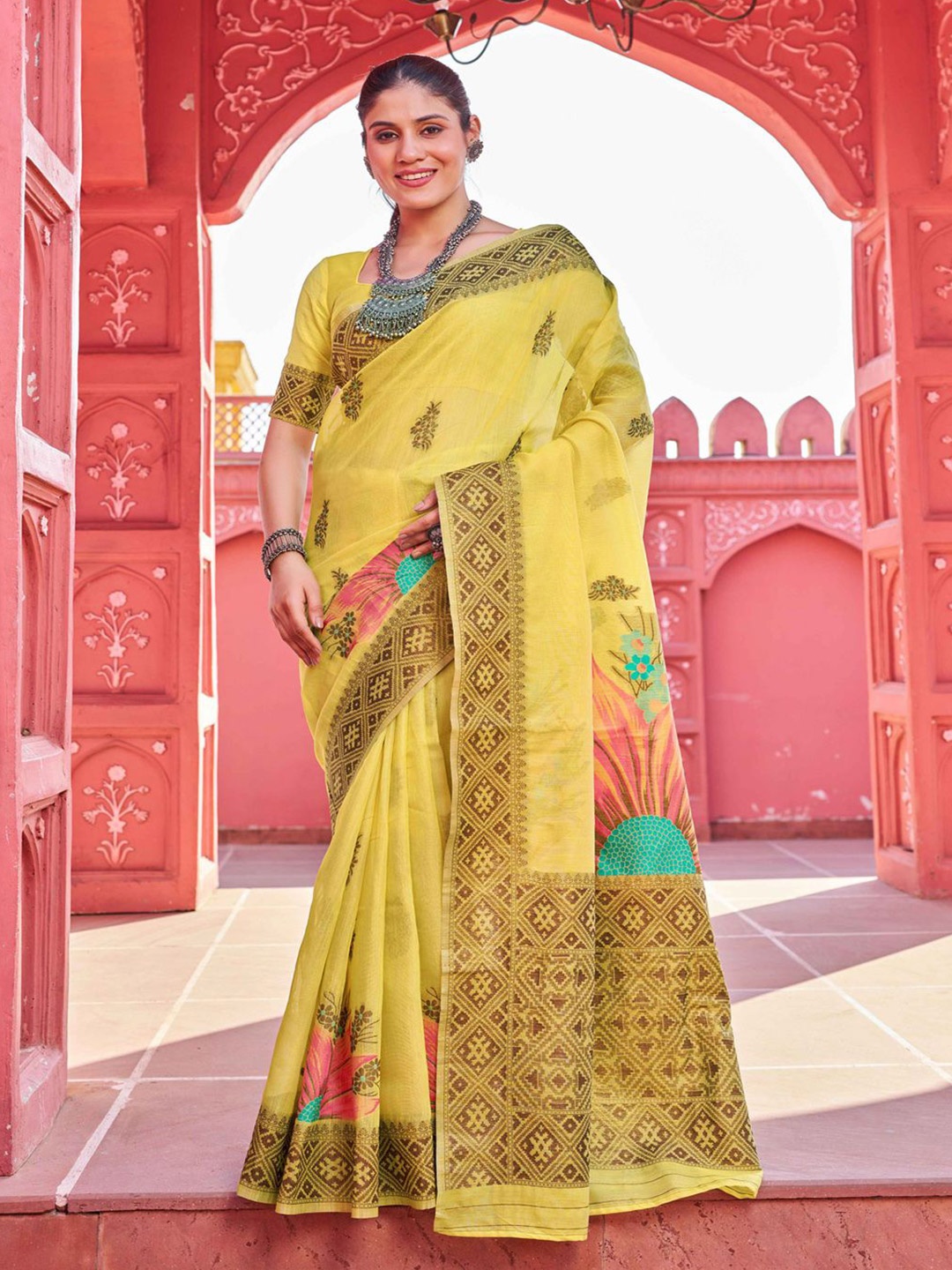 

Krimmple Floral Printed Saree With Printed Border, Yellow