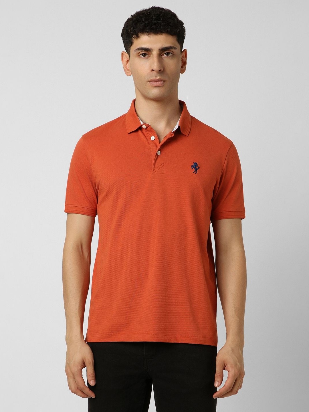 

Van Heusen Sport Men Self Design Polo Collar Cotton T-shirt, Orange