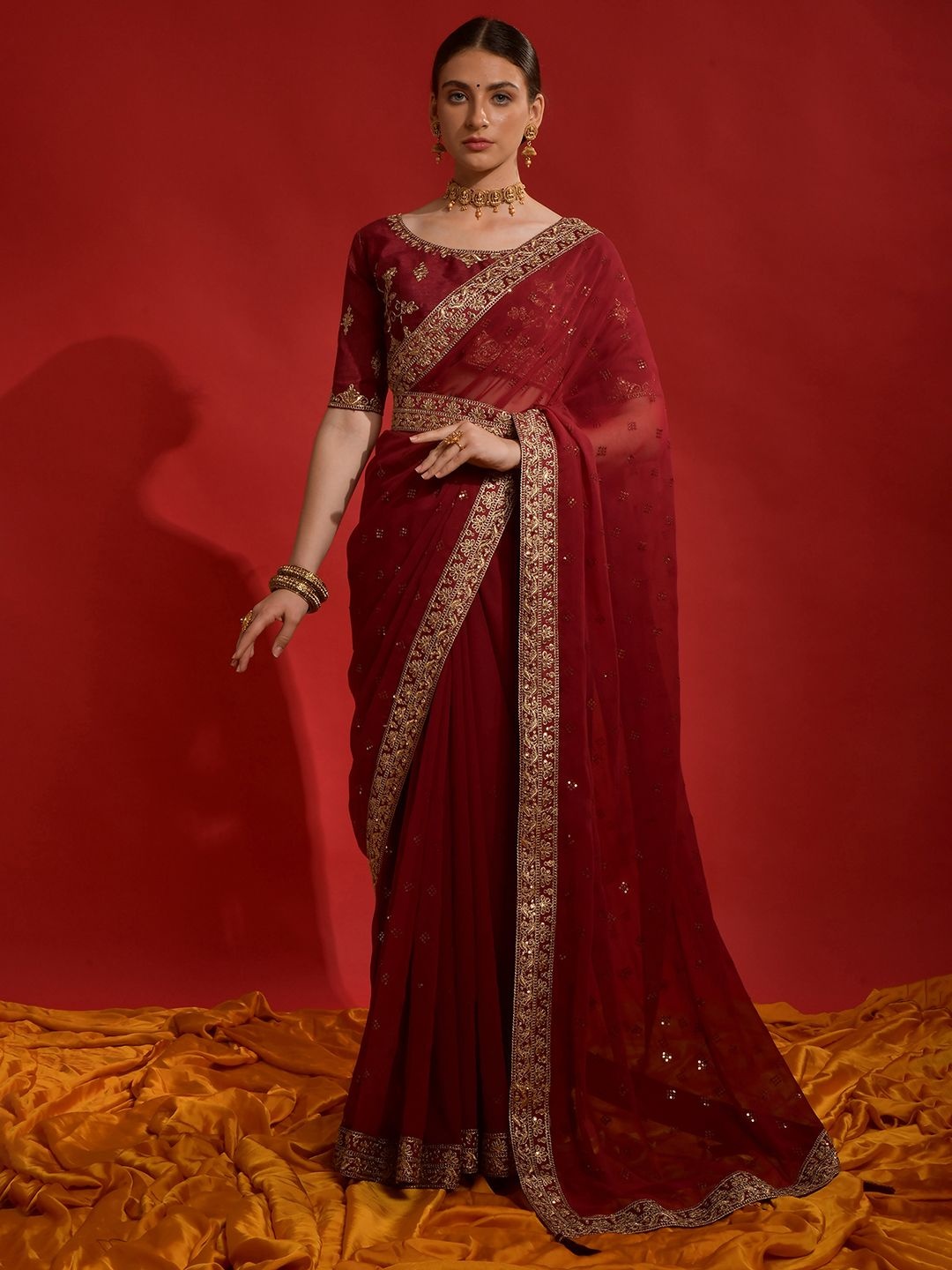 

Sangria Georgette Embroidered Saree With Matching Blouse, Maroon