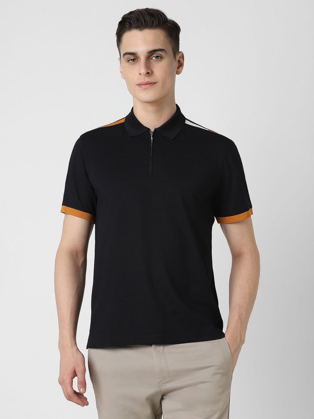 

Van Heusen Sport Men Solid Polo Collar Cotton T-shirt, Black