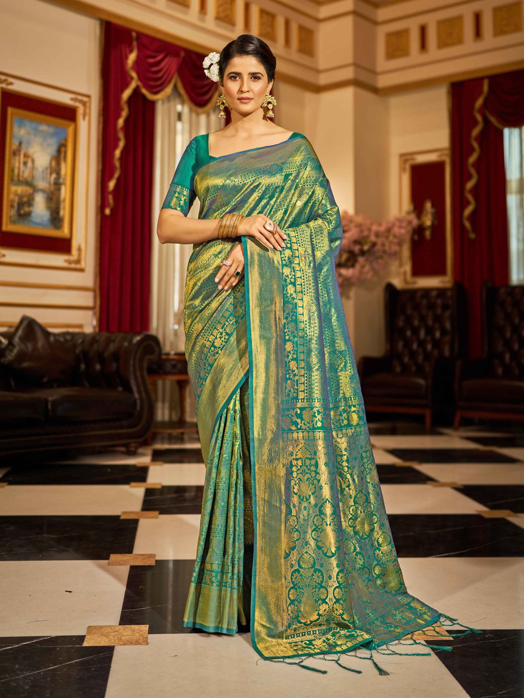 

Krimmple Woven Design Saree With Zari Border, Teal