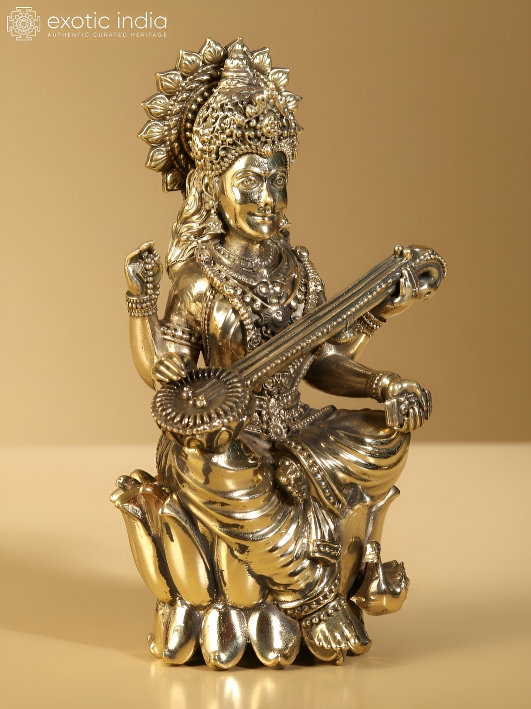 

Exotic India Gold-Toned Maa Saraswati Brass Religious Idol Showpiece