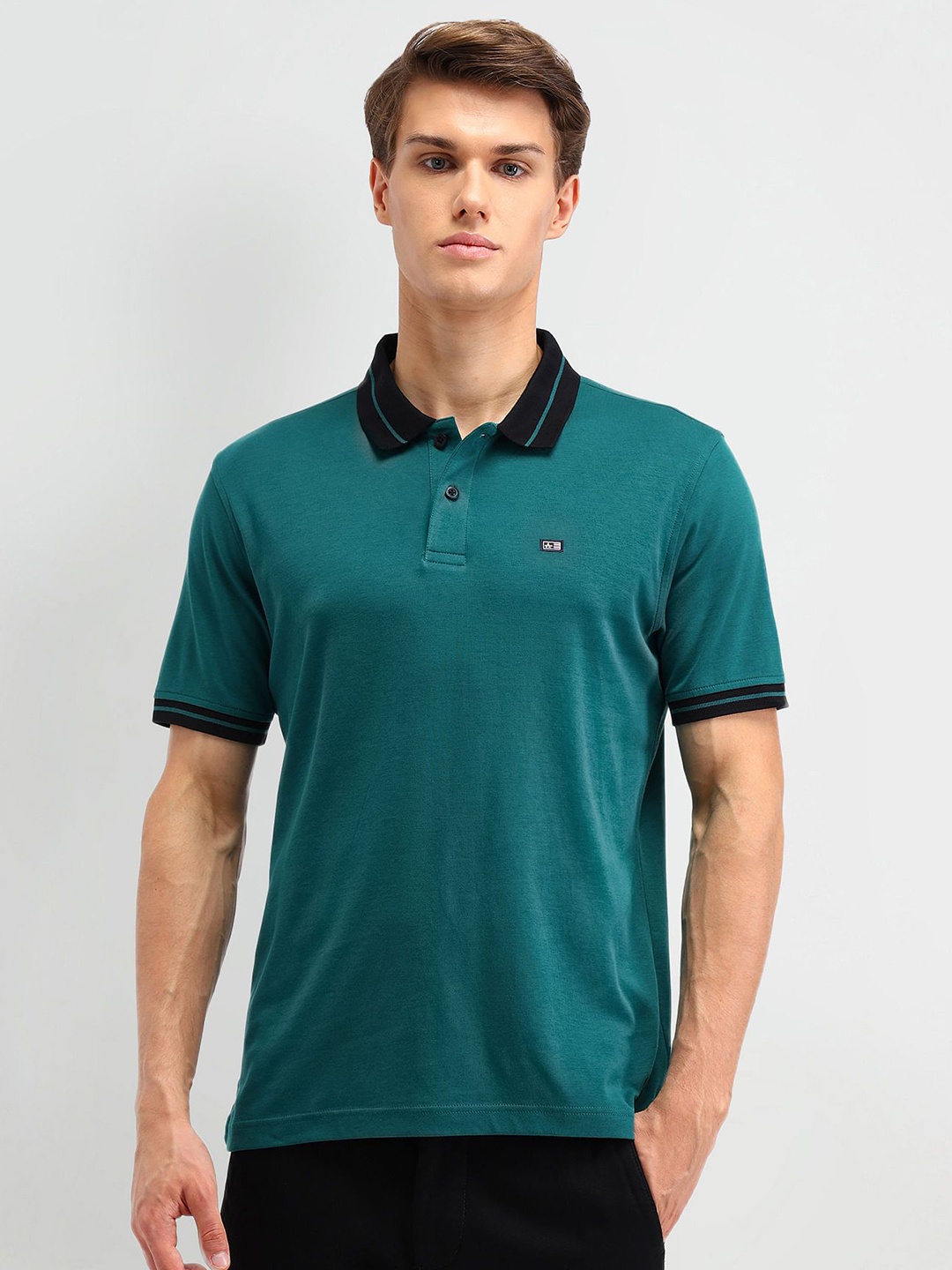 

Arrow Sport Men Solid Polo Collar Cotton T-shirt, Teal