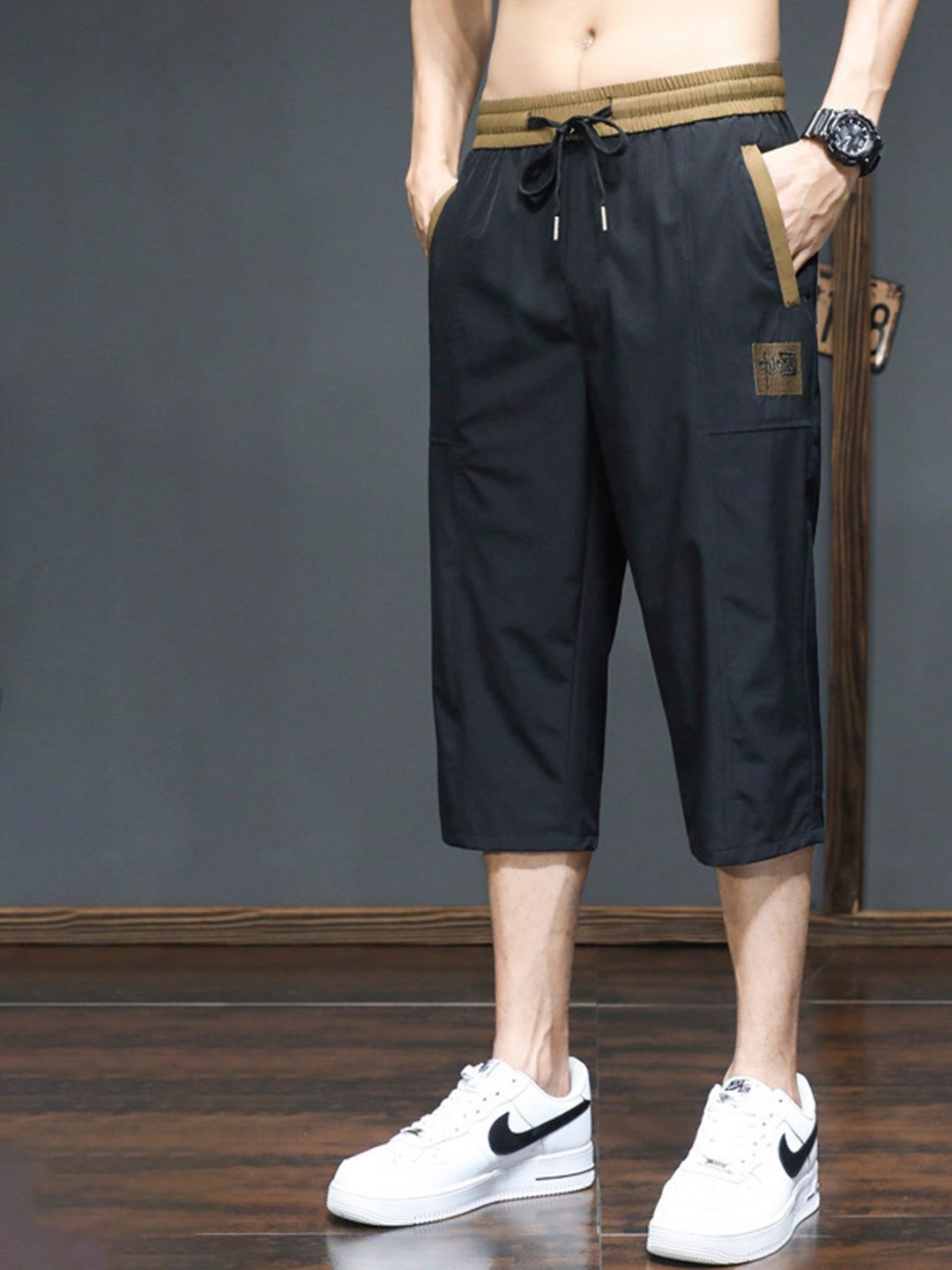 

HERE&NOW Men Solid Mid-Rise Regular Fit Shorts, Black