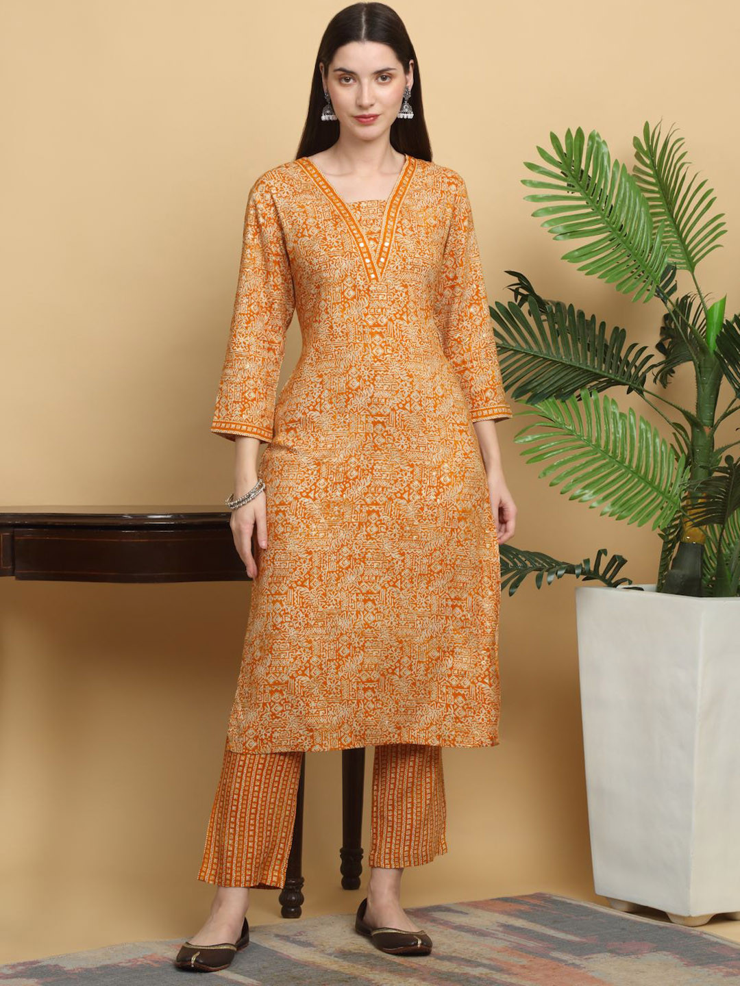 

KALINI Ethnic Motifs Printed V-Neck Mirror Work Straight Kurta with Trousers, Mustard