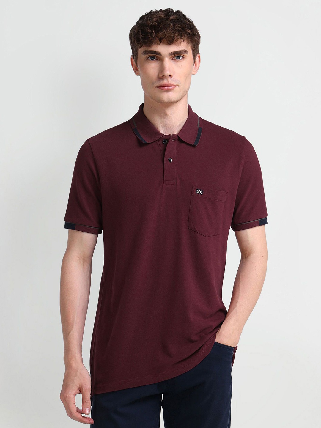 

Arrow Sport Men Solid Polo Collar Cotton T-shirt, Maroon