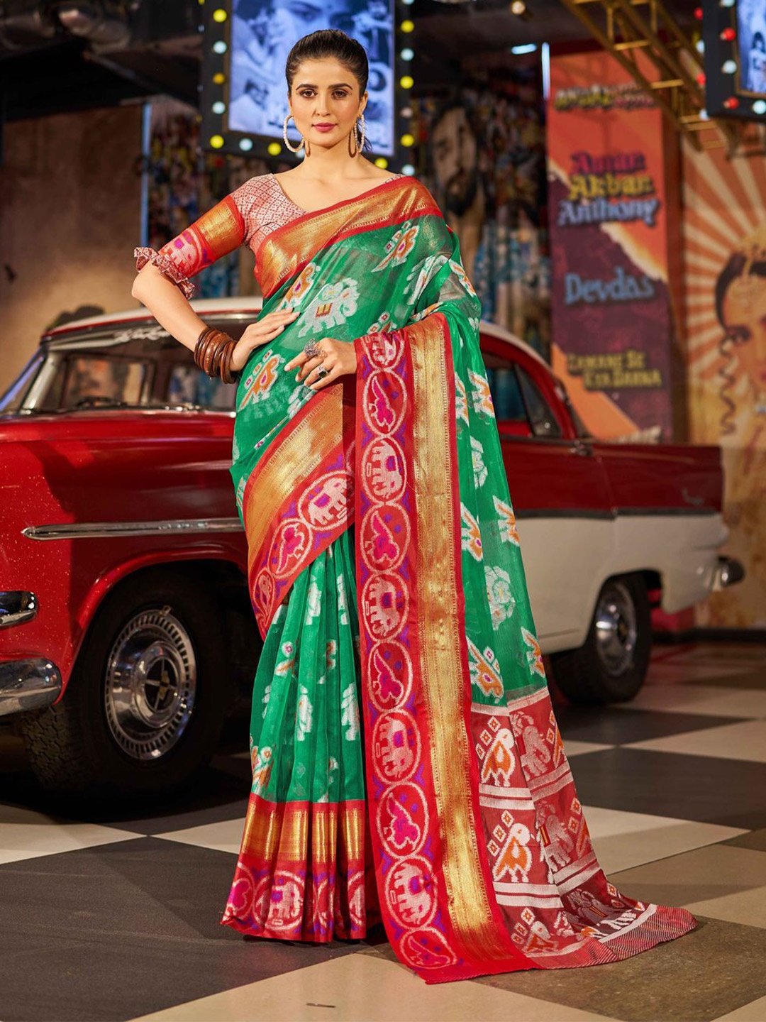 

Krimmple Woven Design Traditional Patola Saree With Zari, Green