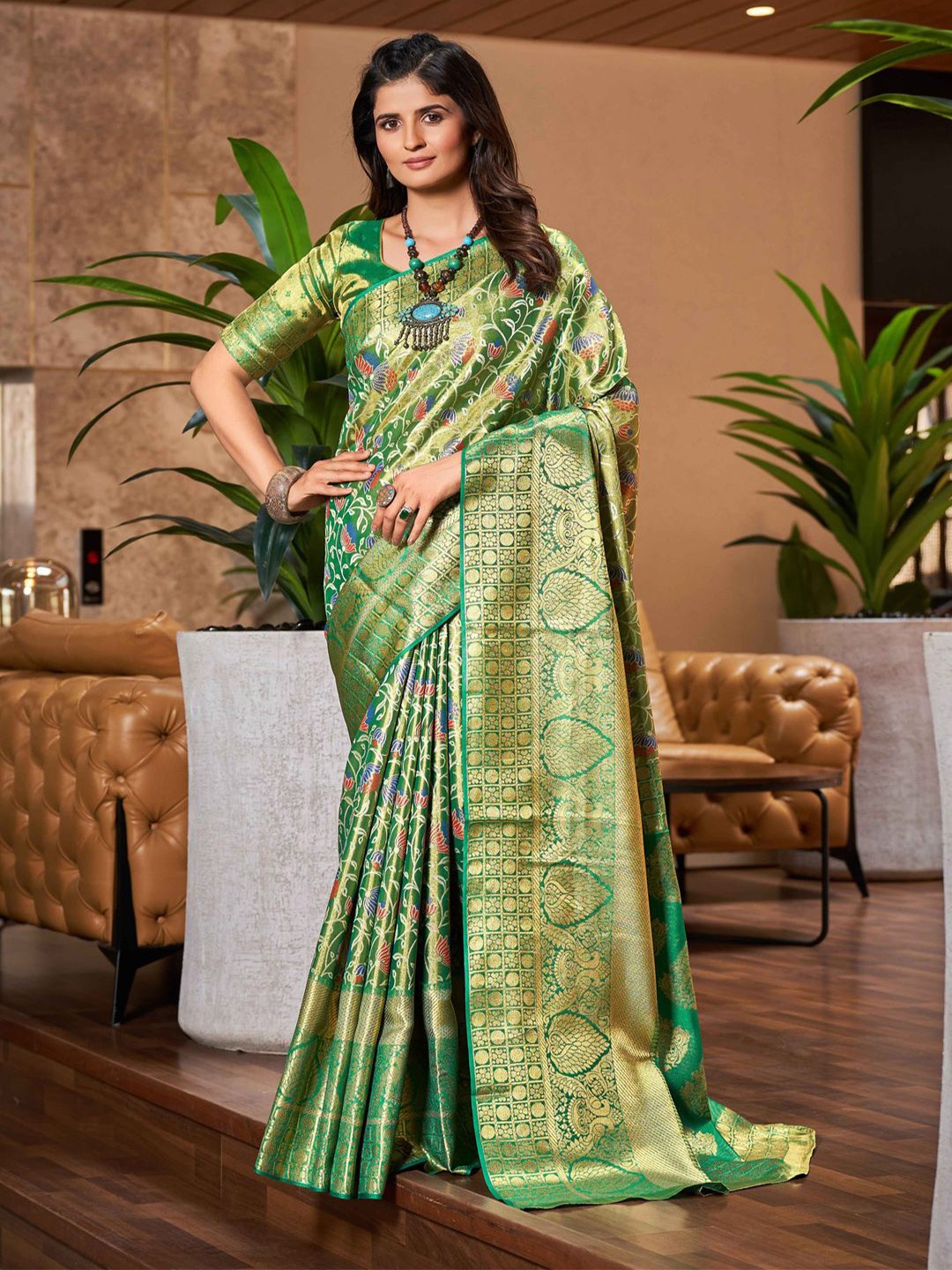 

Krimmple Ethnic Motifs Woven Design Zari Saree, Green