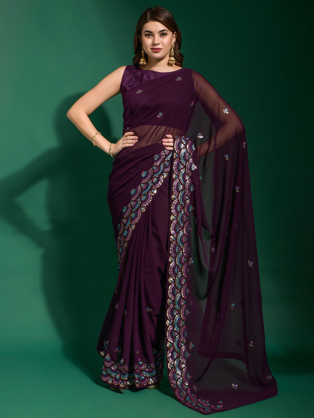 

Sangria Solid Georgette Embellished Saree With Matching Blouse, Purple