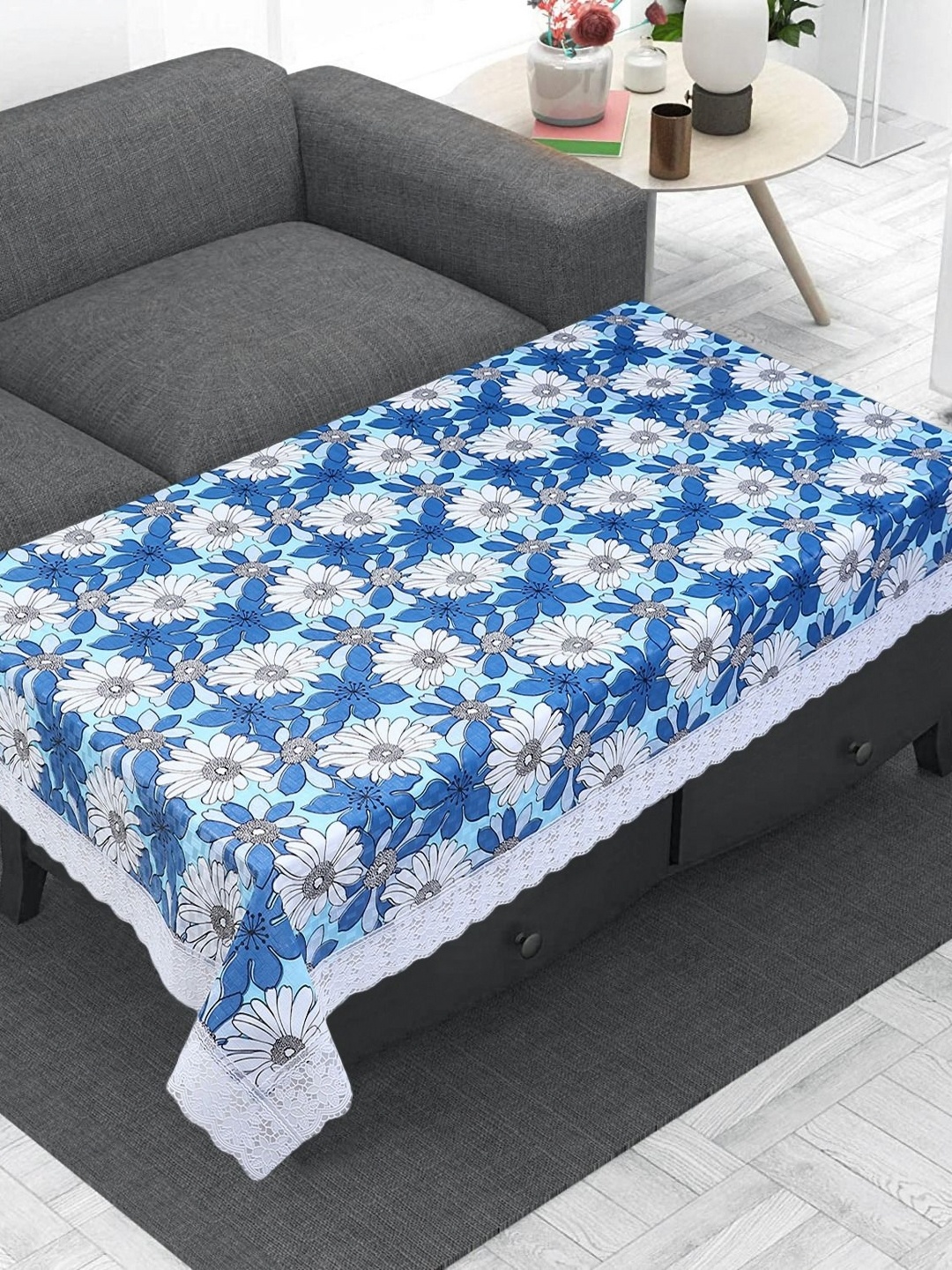 

LooMantha Blue & White Floral Printed Waterproof Plastic 4 Seater Table Cover