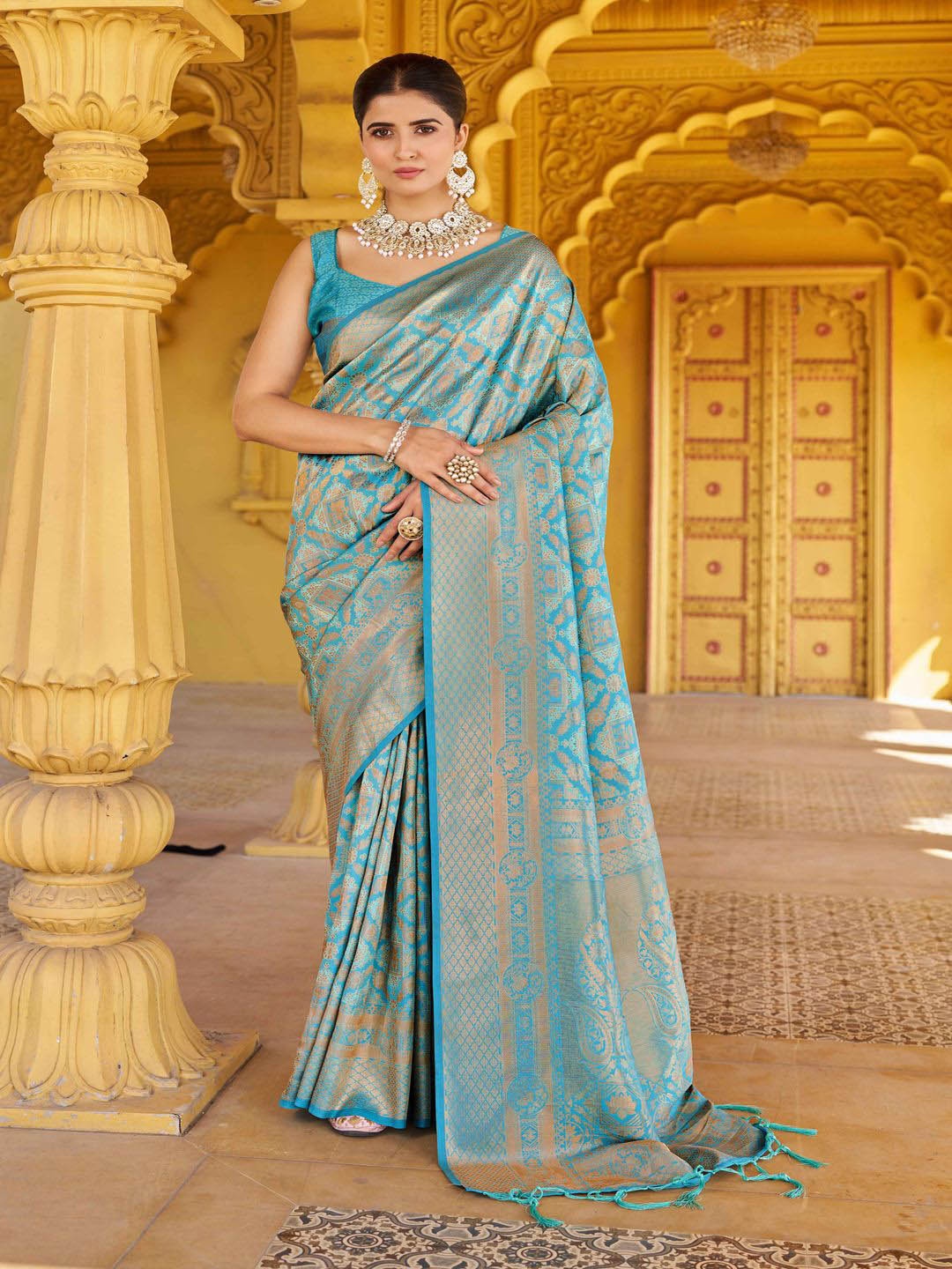 

Krimmple Ethnic Motifs Woven Design Zari Saree, Sea green