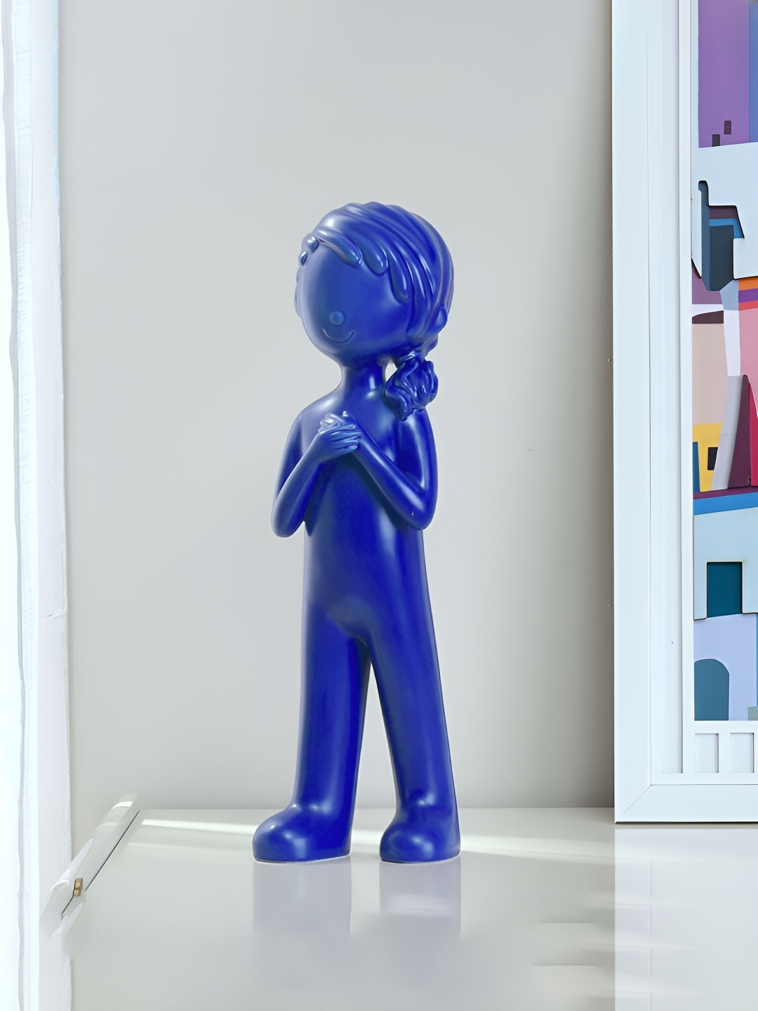 

Athome by Nilkamal Blue Ceramic Girl Standing Showpiece
