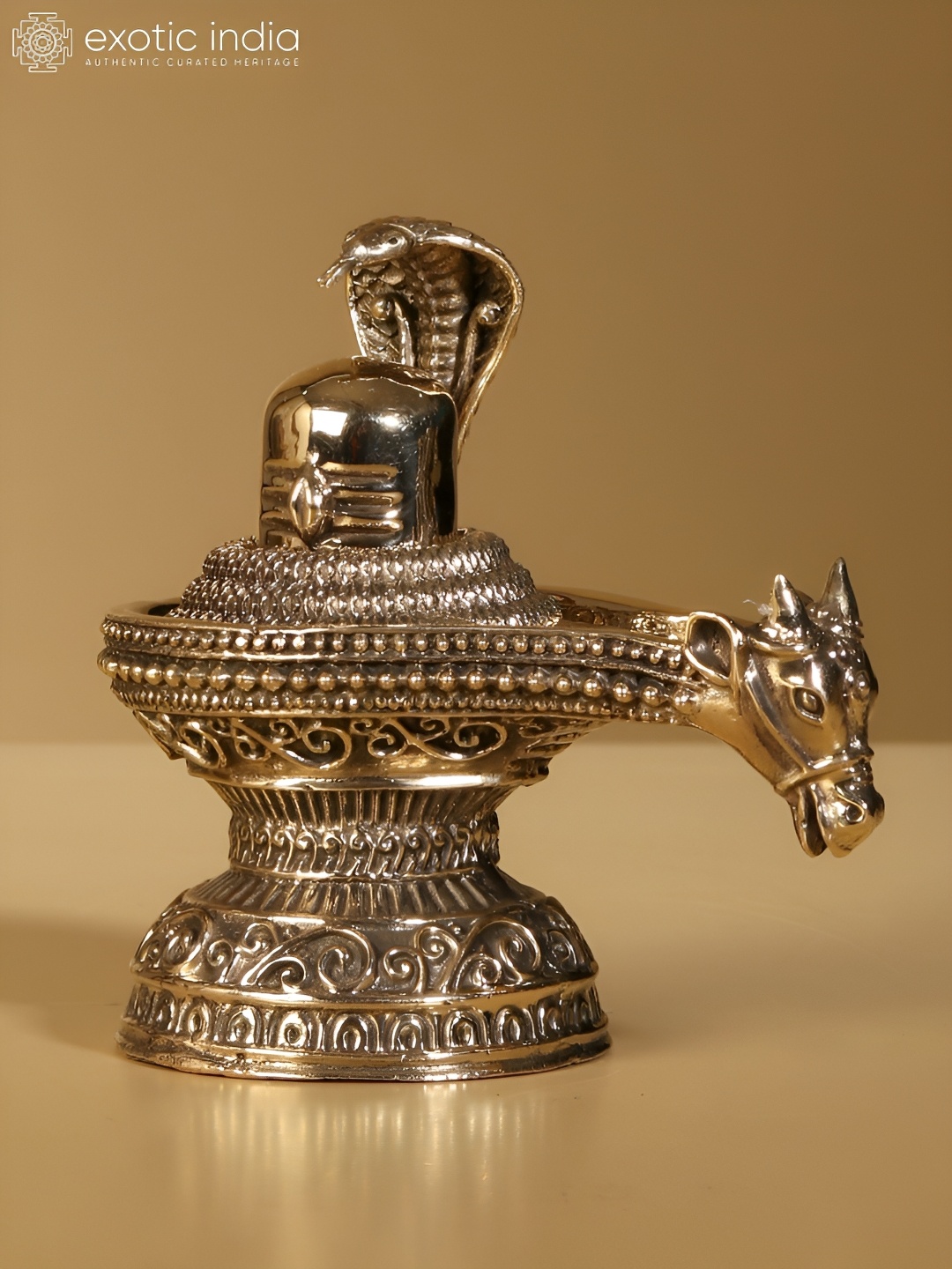 

Exotic India Gold-Toned Shivalinga Religious Figurine Showpiece