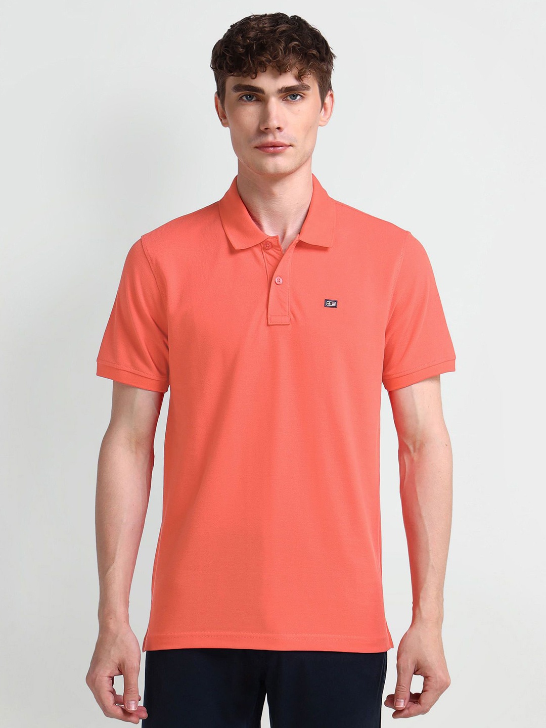 

Arrow Sport Men Solid Polo Collar Cotton T-shirt, Orange