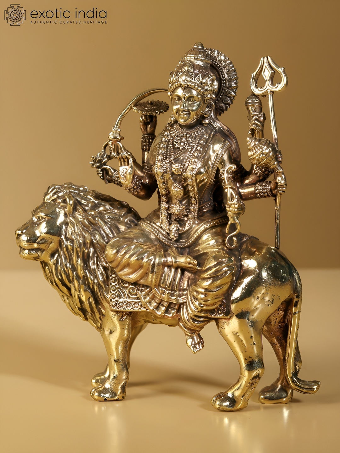 

Exotic India Gold-Toned Four-Armed Maa Sherawali Religious Figurine Showpiece