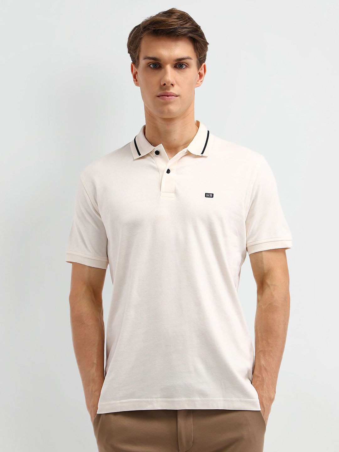 

Arrow Sport Men Solid Polo Collar Cotton T-shirt, White