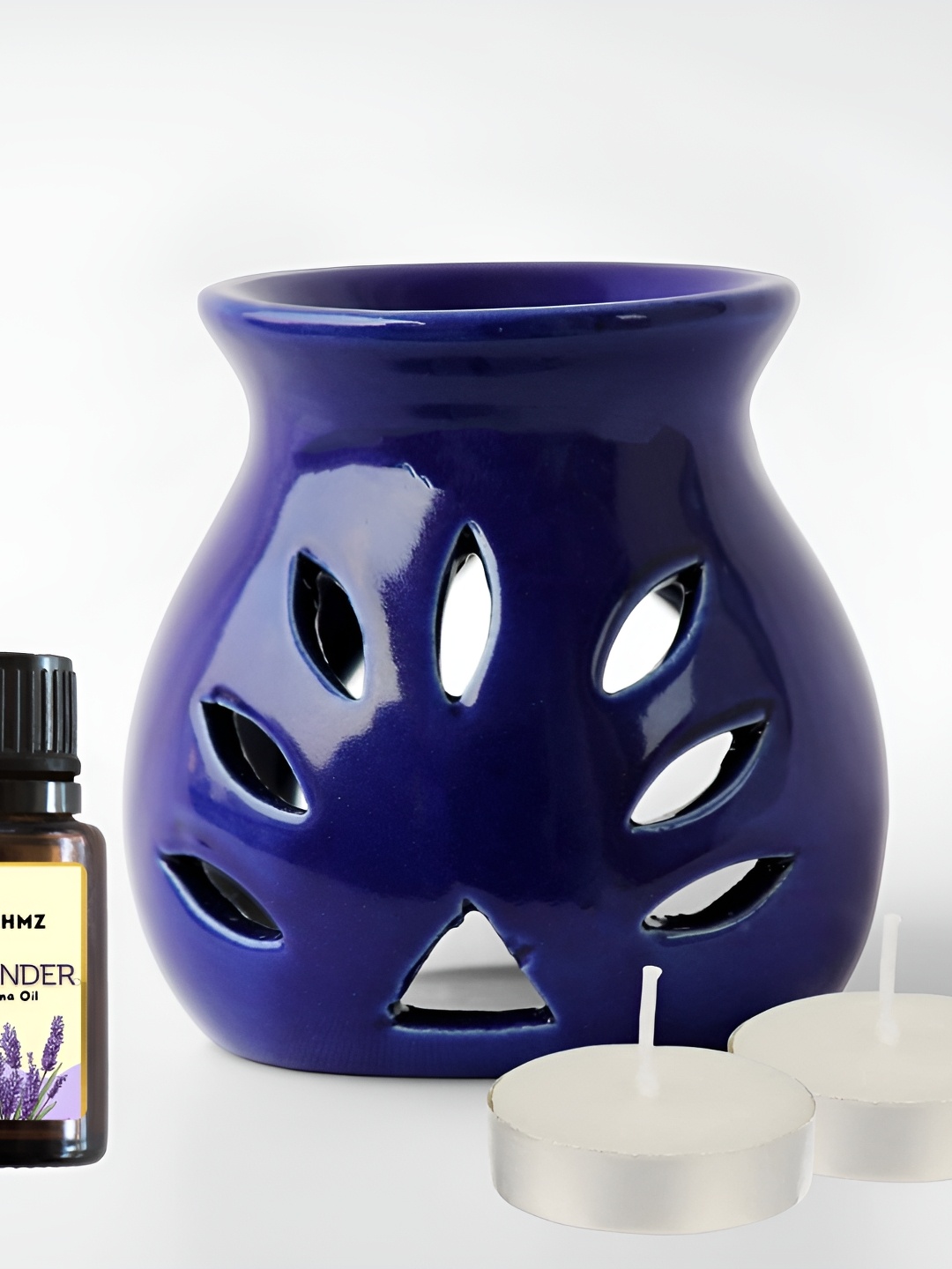 

Brahmz Blue 4 Pieces Candle Square Pot With Tealights & Lavendar Oil Aroma Diffusers