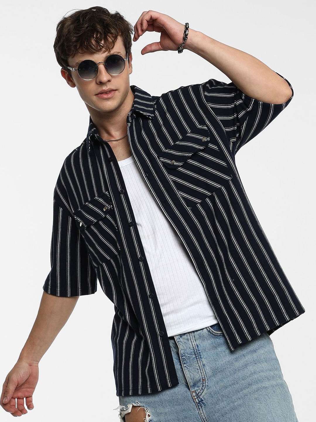 

Campus Sutra Men Comfort Spread Collar Vertical Striped Polycotton Oversized Casual Shirt, Navy blue