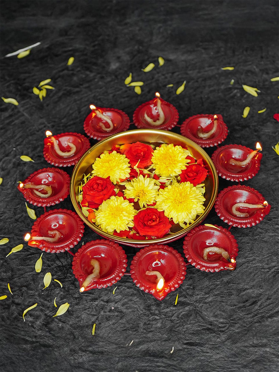 

Ekhasa Gold Toned & Red Textured Decorative Urli Bowl With Attached Oil Diyas