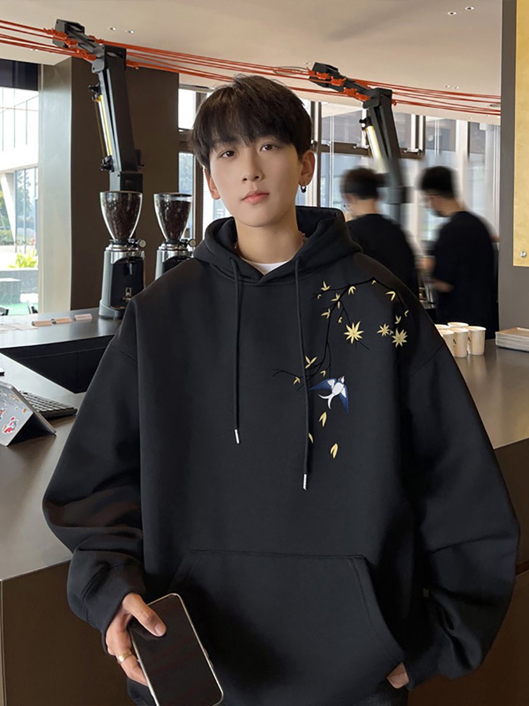 

StyleCast x Revolte Men Printed Hooded Oversized Sweatshirt, Black