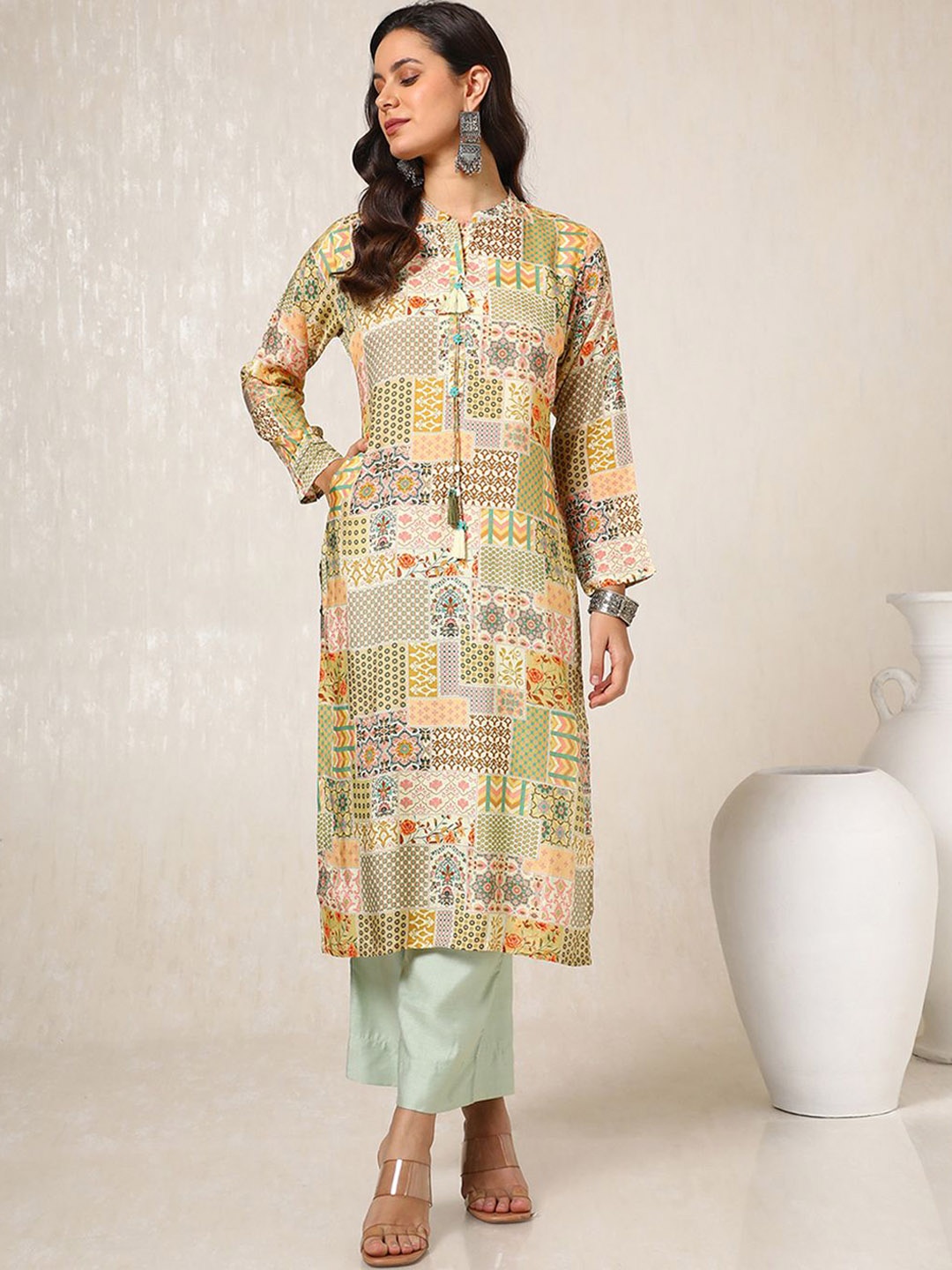 

Soch Cream-Coloured Ethnic Motifs Printed Mandarin Collar Straight Kurta With Tassels