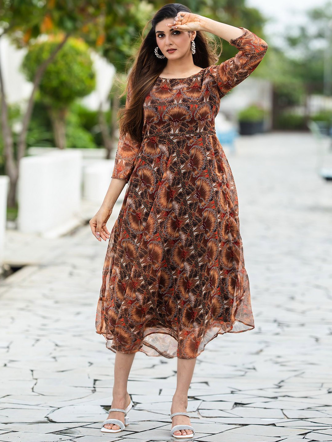 

Divyadham Textiles Floral Printed Round Neck Georgette Midi Ethnic Dresses, Brown