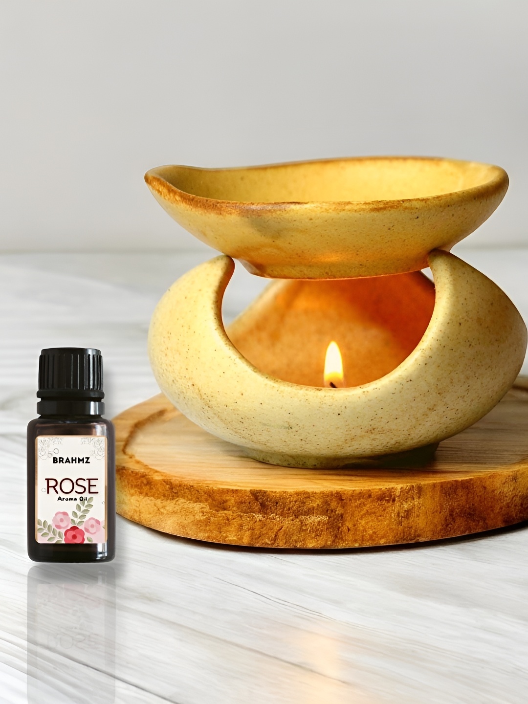 

Brahmz Light Brown Aroma Diffuser With 2 Tealights & Rose Oil