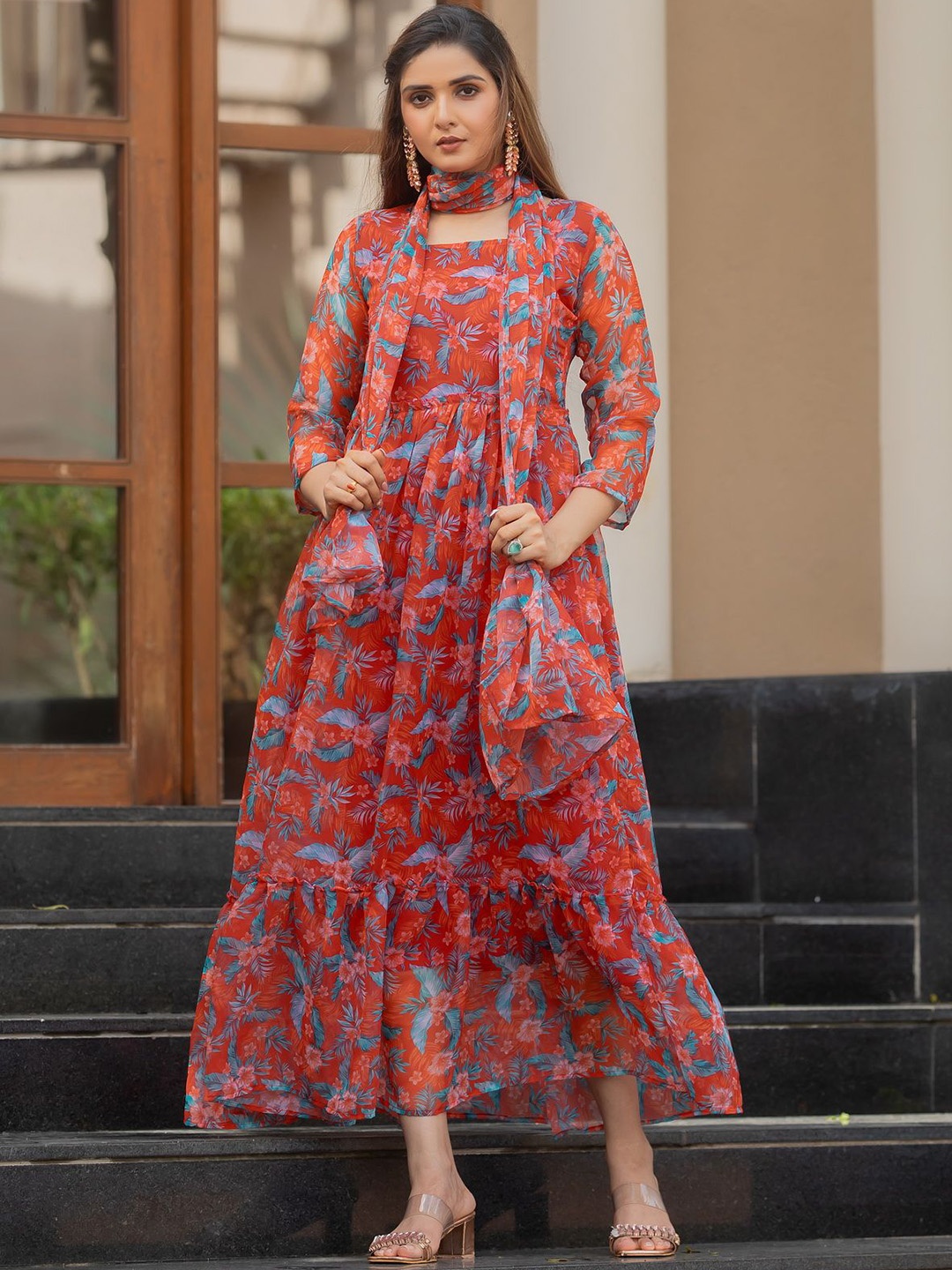 

Divyadham Textiles Floral Printed Square Neck Georgette Maxi Ethnic Dresses With Dupatta, Coral