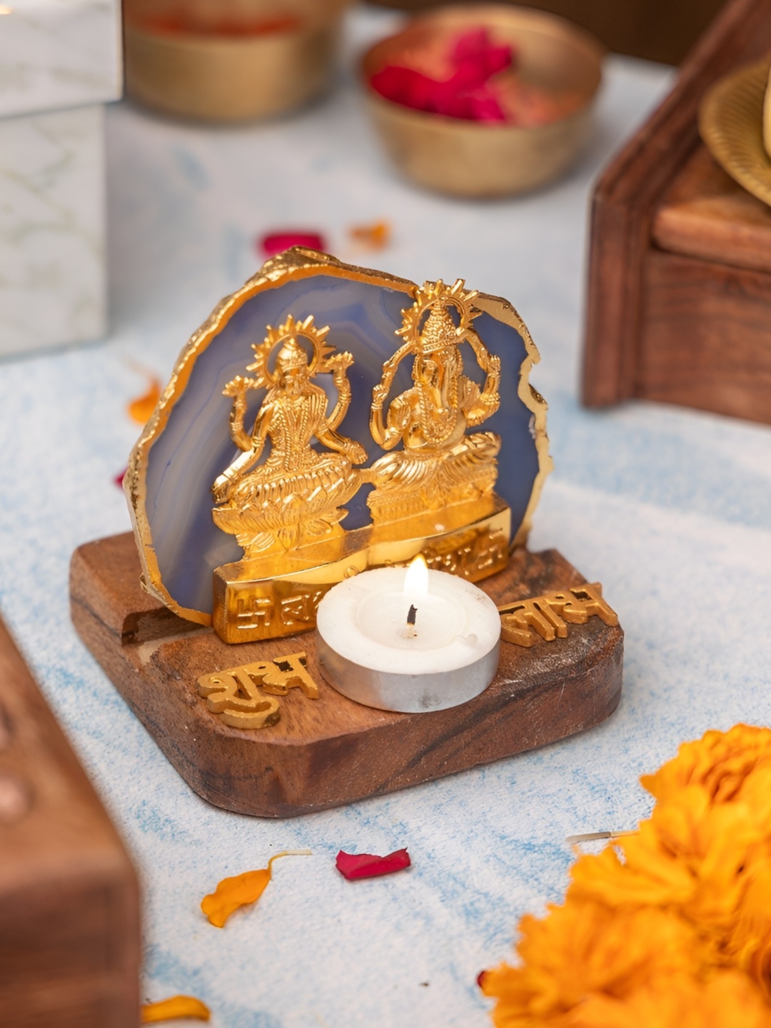 

HOMEARTE Blue Laxmi Ganesha with Blue Agate and Wooden Base Showpiece Tealight Holder